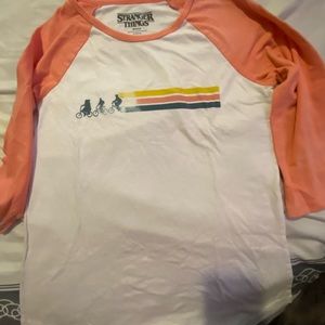 Stranger things shirt that’s pink and white